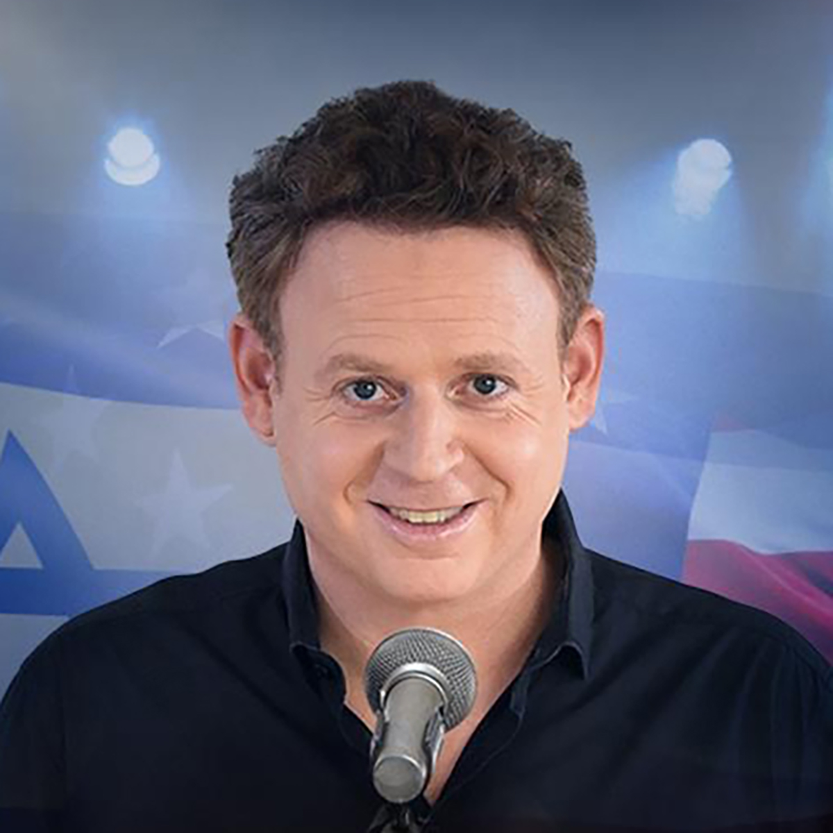 Comedian Lior Schleien with microphone