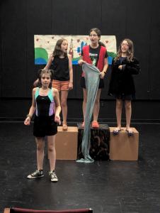 image of youth performers on stage