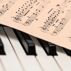 sheet music and piano keys